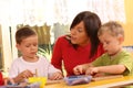 Preschoolers with wooden block