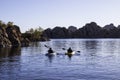 Prescott, Arizona, USA 04/24/2019 A man and woman kayaking on the early morning on Watson Lake