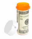 Prescription bottle wrapped in a $20 bill Royalty Free Stock Photo