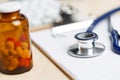 Prescription form clipped to pad lying on table Royalty Free Stock Photo