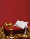 Present box with greeting card Royalty Free Stock Photo
