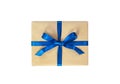 Present box package in craft paper over white background. Top view