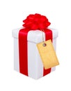 Present box with red bow and blank tag isolated on white Royalty Free Stock Photo