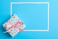 Present and frame on color background Royalty Free Stock Photo