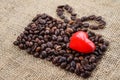 Present made of coffee beans with red heart