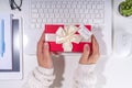 Present from secret santa on workplace Royalty Free Stock Photo