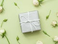 Present silver gift box roses floral arrangement Royalty Free Stock Photo