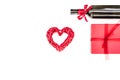 Present for Valentine day in red colors. Wine and gift box on white background top view copy space