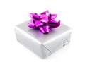 Present wrapped in silver paper and pink ribbon Royalty Free Stock Photo