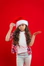 Present for Xmas. Childhood. New year party. Santa claus kid. Christmas shopping. Happy winter holidays. Small upset Royalty Free Stock Photo