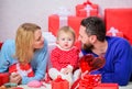 Present for you. Love and trust in family. Bearded man and woman with little girl. Valentines day. Red boxes. father Royalty Free Stock Photo