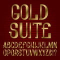 Presentable retro style font. Golden capital letters. english alphabet with text Gold Suite Royalty Free Stock Photo