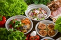 Presentation of georgian cuisine. Baked mushrooms with suluguni cheese, Tbilisi Caesar, caprese, lavash bread, Pkhali. Royalty Free Stock Photo