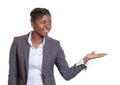 Presentation of a happy African business woman Royalty Free Stock Photo