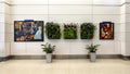 Presentation of reproductions of paintings and plants in Detroit Airport by the Detroit Institue of Arts.