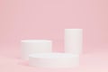 Presentation shape with round circular pedestal white podium for product display on pink color background, stand for product