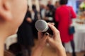 Presenter on stage with microphone. Wedding MC. Toastmaster.