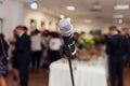 Presenter on stage with microphone. Wedding MC. Toastmaster.