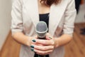 Presenter on stage with microphone. Wedding MC. Toastmaster.