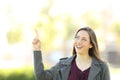 Presenter woman pointing above Royalty Free Stock Photo
