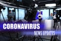 Presenters and video camera operator working. Coronavirus pandemic - latest updates