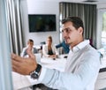 Presenting big ideas. a young businessman giving a presentation to his colleagues in an office. Royalty Free Stock Photo