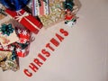 Presents with christmas written underneath Royalty Free Stock Photo