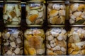 The preserve mushrooms. Delicious marinated white mushrooms in the glass jars. Homemade preservation in autumn