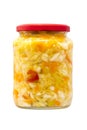 Preserved cabbage and red paprika salad in glass jar on a white background. Royalty Free Stock Photo