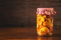 Preserved fruit in jar, compote of peaches