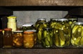 Preserves in jars in home basement. Close up of stocks kept for the winter