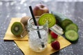 Preserving jar in close-up with crushred ice and kiwi disc. Royalty Free Stock Photo