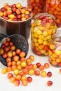 Preserving Mirabelle plums - jars of homemade fruit preserves Royalty Free Stock Photo