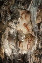 Preshistoric petroglyph rock paintings in Raja Ampat, West Papua, Indonesia.