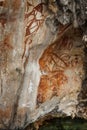 Preshistoric petroglyph rock paintings in Raja Ampat, West Papua, Indonesia.