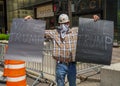 President Donald Trump supporter with signs `Vote Trump` in front of Trump Tower at 5th Avenue in Manhattan
