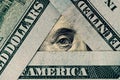 President Franklin`s eye in a triangle of hundred dollar bills.