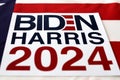 Biden Harris 2024 Written over Waving American Flag