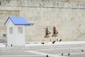 Presidential Guard outside Presidential Mansion and wall with greek character signs guards Tomb of Unknown Soldier