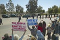 Presidential Motorcade with President George W. Bush past anti-Bush political rally with signs that read Impeach Bush in Tucson Royalty Free Stock Photo