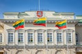 Presidential Palace in Vilnius and Lithuanian flags at sunny day, Lithuania Royalty Free Stock Photo