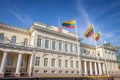 Presidential Palace in Vilnius and Lithuanian flags at sunny day, Lithuania Royalty Free Stock Photo