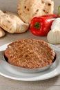Presliced traditional burger patty called pljeskavica
