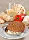 Presliced traditional burger patty called pljeskavica, Royalty Free Stock Photo