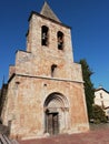 Prespective of a Romanesque church on a sunny day.