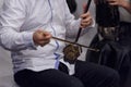 Musician plays erhu during the press conference 