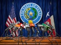 Press conference of governor of the state of Texas concept. Microphones TV and radio channels with symbol and flag of Texas state