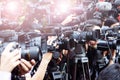 Press and media camera ,video photographer on duty in public new Royalty Free Stock Photo