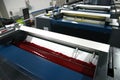 Press printing - Offset machine. Printing technique where the inked image is transferred from a plate to a rubber blanket, then to Royalty Free Stock Photo