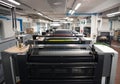 Press printing - Offset machine. Printing technique where the inked image is transferred from a plate to a rubber blanket, then to Royalty Free Stock Photo